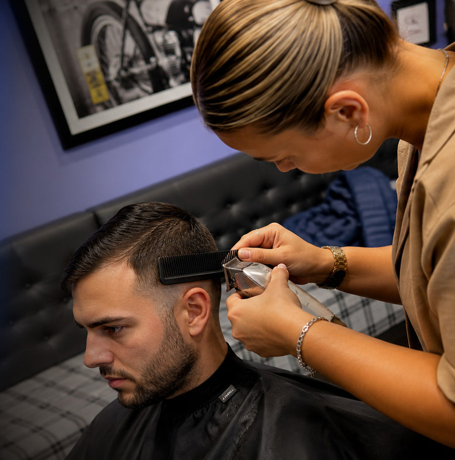 Megan cutting a client's hair at MJ Barbering inside Mas Body Gym Middlesbrough