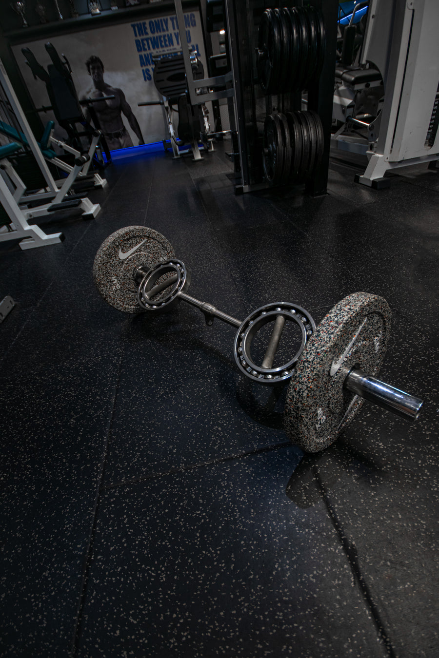 Strength Shop rotating curl bar with Nike plates at Mas Body Gym Middlesbrough